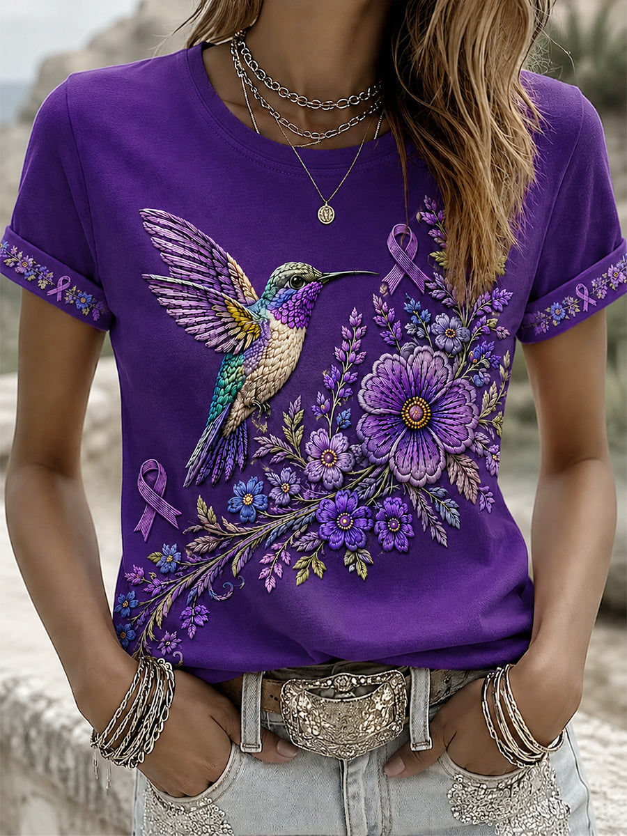 T-shirt de soutien violet à imprimé floral et colibri pour femmes