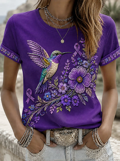 T-shirt de soutien violet à imprimé floral et colibri pour femmes