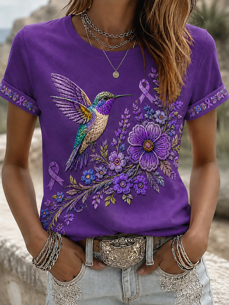 T-shirt de soutien violet à imprimé floral et colibri pour femmes