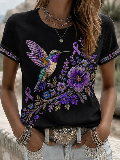 T-shirt de soutien violet à imprimé floral et colibri pour femmes