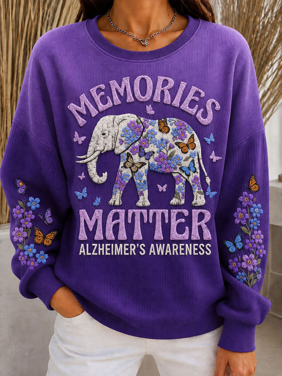 Sweat à col rond côtelé motif éléphant Alzheimer pour femme
