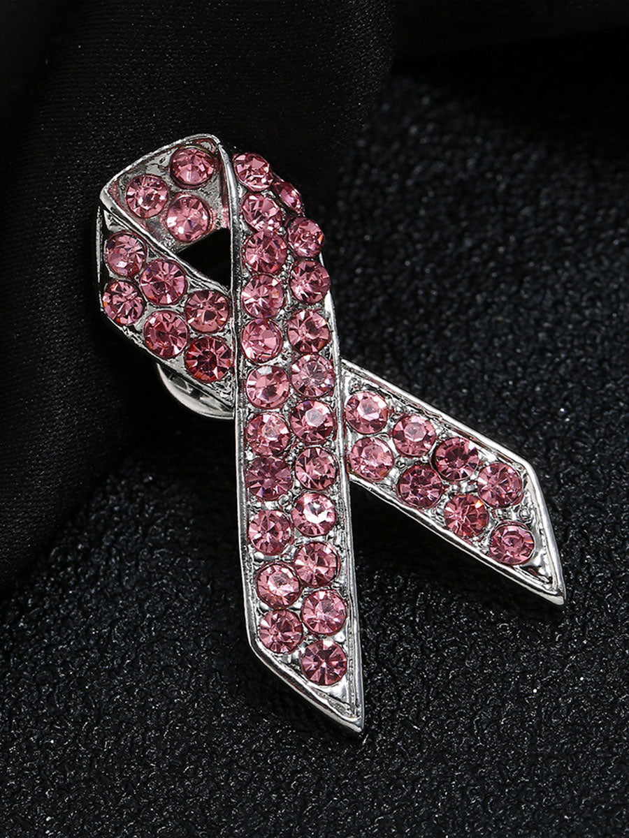 Broche rose contre le cancer du sein chez la femme
