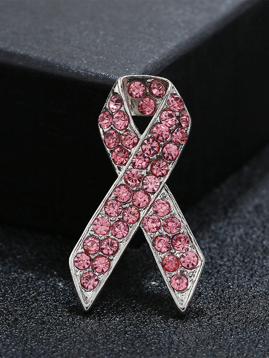 Broche rose contre le cancer du sein chez la femme