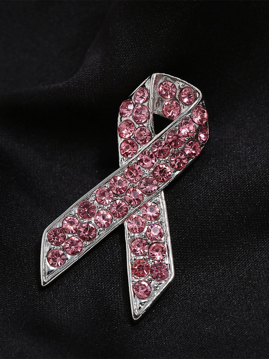Broche rose contre le cancer du sein chez la femme