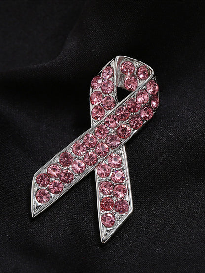 Broche rose contre le cancer du sein chez la femme