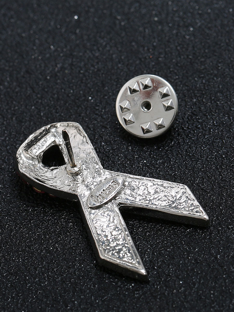 Broche rose contre le cancer du sein chez la femme