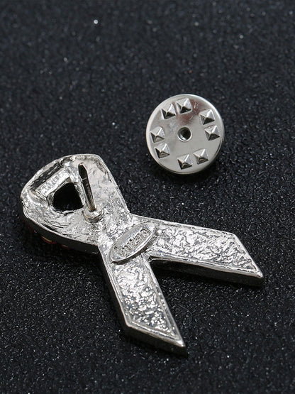 Broche rose contre le cancer du sein chez la femme